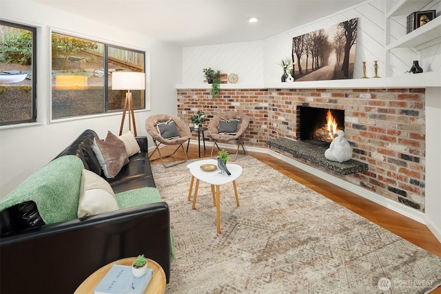 6687 NE Bayview Blvd, Bainbridge Island, WA 98110 - living room with wood finished floors, a fireplace, and recessed lighting