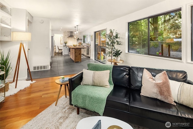 6687 NE Bayview Blvd, Bainbridge Island, WA 98110 - living area with dark wood finished floors and baseboards