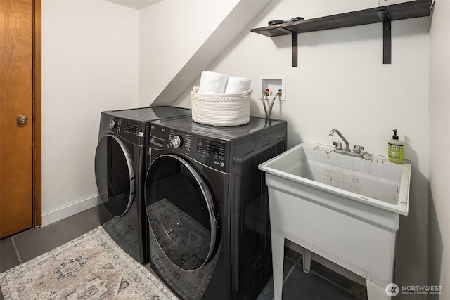 6687 NE Bayview Blvd, Bainbridge Island, WA 98110 - laundry room featuring washing machine and clothes dryer and baseboards