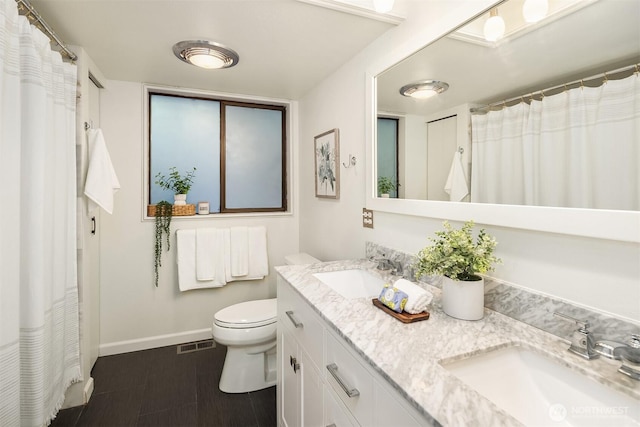 6687 NE Bayview Blvd, Bainbridge Island, WA 98110 - bathroom featuring double vanity and a shower with shower curtain