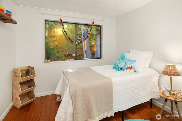 6687 NE Bayview Blvd, Bainbridge Island, WA 98110 - bedroom featuring baseboards and wood finished floors