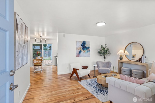 8808 NE 139th St, Kirkland, WA 98034 - living room featuring a chandelier and light wood finished floors