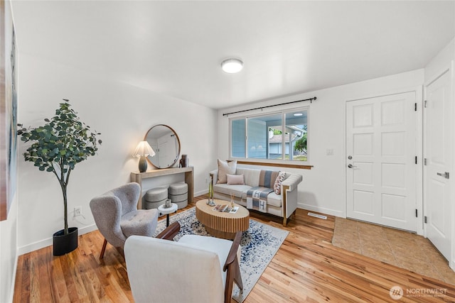 8808 NE 139th St, Kirkland, WA 98034 - living room featuring light wood finished floors and baseboards