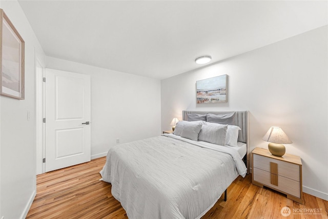 8808 NE 139th St, Kirkland, WA 98034 - bedroom featuring baseboards and light wood finished floors
