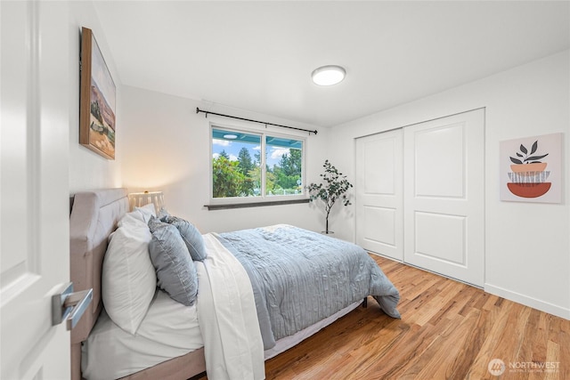 8808 NE 139th St, Kirkland, WA 98034 - bedroom featuring light wood-style flooring and a closet