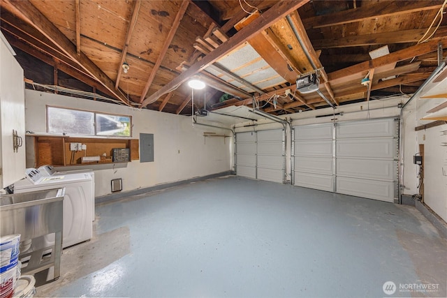 8808 NE 139th St, Kirkland, WA 98034 - garage featuring electric panel, a garage door opener, and washer and clothes dryer