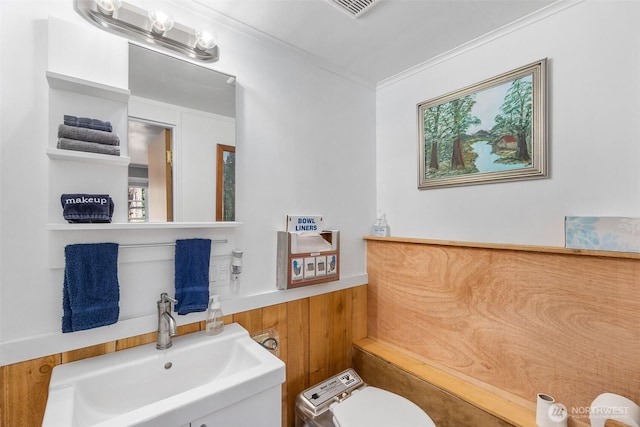 1205 Summit Lake Shore Rd NW, Olympia, WA 98502 - half bathroom featuring a sink and ornamental molding