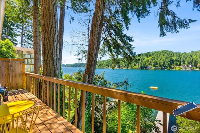 1205 Summit Lake Shore Rd NW, Olympia, WA 98502 - wooden deck with a water view and a wooded view