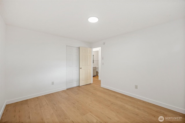 6604 S Madison St, Tacoma, WA 98409 - empty room featuring baseboards and light wood-type flooring