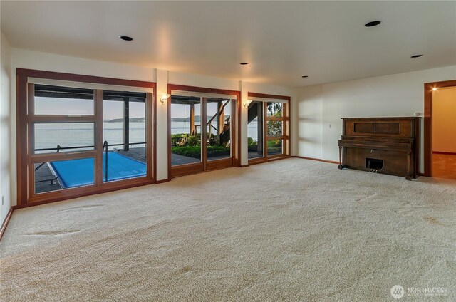 9913 Point View St NE, Olympia, WA 98516 - unfurnished living room with carpet floors