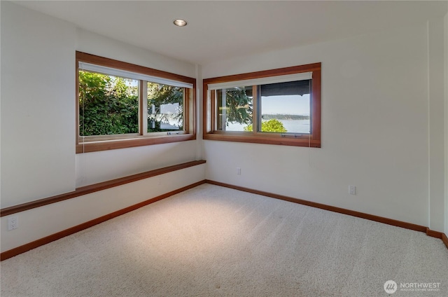 9913 Point View St NE, Olympia, WA 98516 - carpeted spare room with baseboards and recessed lighting