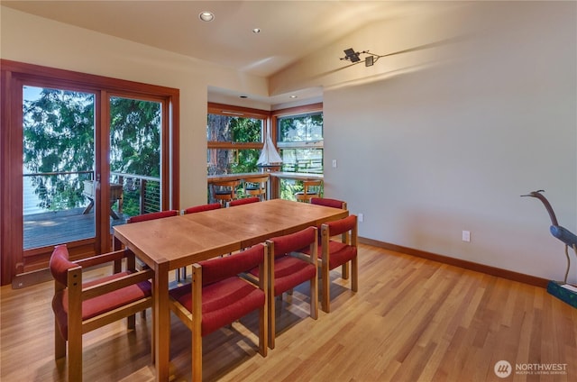 9913 Point View St NE, Olympia, WA 98516 - dining area featuring light wood-style floors, vaulted ceiling, and recessed lighting