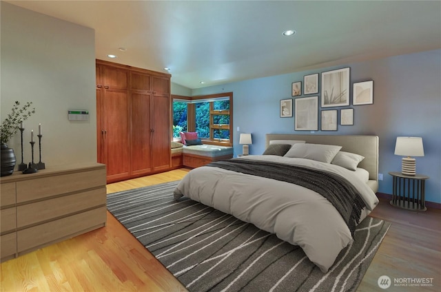 9913 Point View St NE, Olympia, WA 98516 - bedroom with light wood-style flooring and recessed lighting