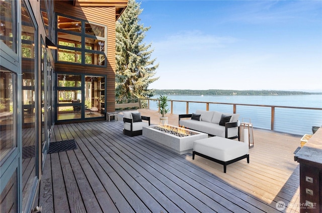 9913 Point View St NE, Olympia, WA 98516 - wooden terrace with an outdoor living space with a fire pit and a water view