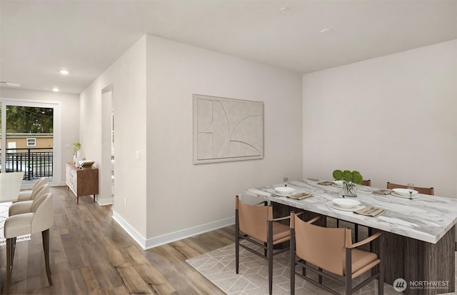 6901 NE 184th Ln Unit 103, Kenmore, WA 98028 - dining room featuring wood finished floors and recessed lighting