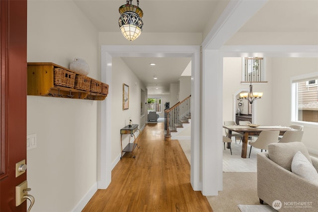 3414 SE 223rd Ave, Sammamish, WA 98075 - entryway with plenty of natural light, light wood-type flooring, a chandelier, and recessed lighting