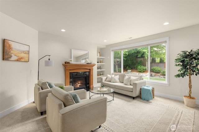 3414 SE 223rd Ave, Sammamish, WA 98075 - carpeted living area featuring recessed lighting, a fireplace, and built in features