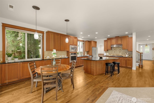 3414 SE 223rd Ave, Sammamish, WA 98075 - dining space with plenty of natural light, light wood-type flooring, and recessed lighting