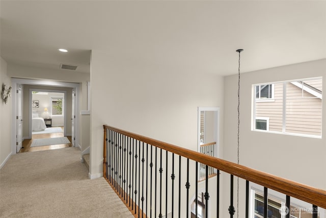 3414 SE 223rd Ave, Sammamish, WA 98075 - hall featuring an upstairs landing, plenty of natural light, carpet, and recessed lighting