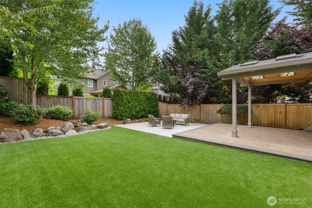 3414 SE 223rd Ave, Sammamish, WA 98075 - fenced backyard with an outdoor living space, a patio, and a gazebo