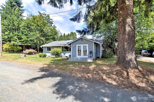 2059 Beverly Blvd, Shelton, WA 98584 - ranch-style house with french doors and board and batten siding