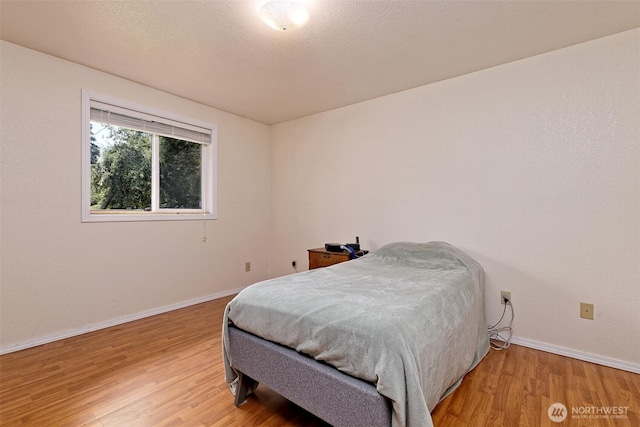 2059 Beverly Blvd, Shelton, WA 98584 - bedroom featuring light wood-style floors and baseboards