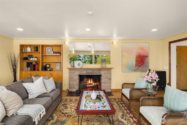 3912 NE 127th St, Seattle, WA 98125 - living room featuring a stone fireplace, wood finished floors, and recessed lighting