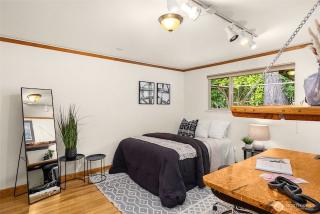 3912 NE 127th St, Seattle, WA 98125 - bedroom with wood finished floors, track lighting, and crown molding
