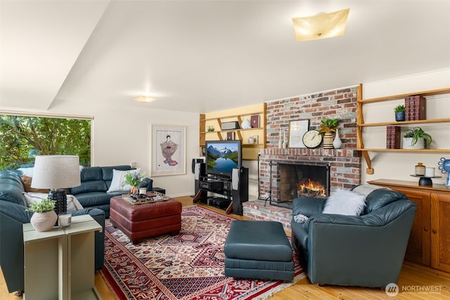 3912 NE 127th St, Seattle, WA 98125 - living area with a fireplace and wood finished floors