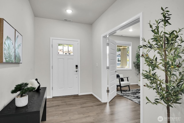 3941 233rd St SE, Bothell, WA 98021 - entryway with wood finished floors and healthy amount of natural light
