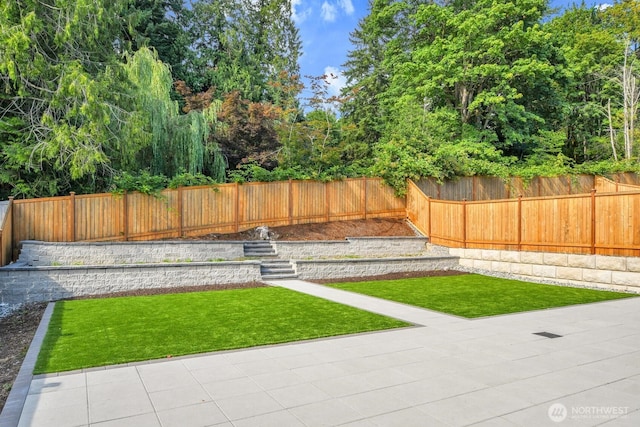 3941 233rd St SE, Bothell, WA 98021 - fenced backyard with a patio