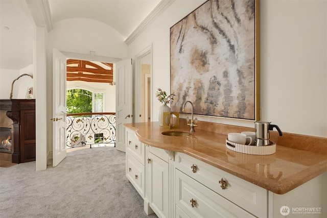 3210 Hunts Point Rd, Hunts Point, WA 98004 - bathroom featuring a sink and lofted ceiling