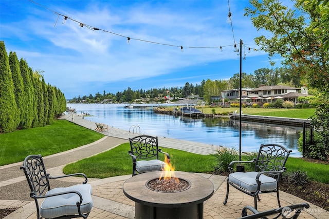 3210 Hunts Point Rd, Hunts Point, WA 98004 - view of patio with a fire pit and a water view