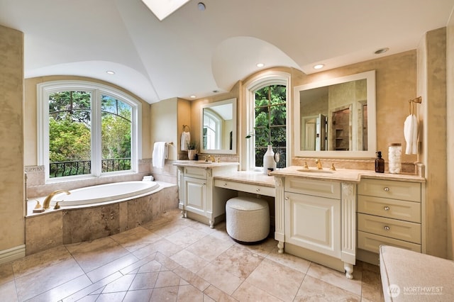 3210 Hunts Point Rd, Hunts Point, WA 98004 - full bath with vanity, a garden tub, recessed lighting, a skylight, and vaulted ceiling