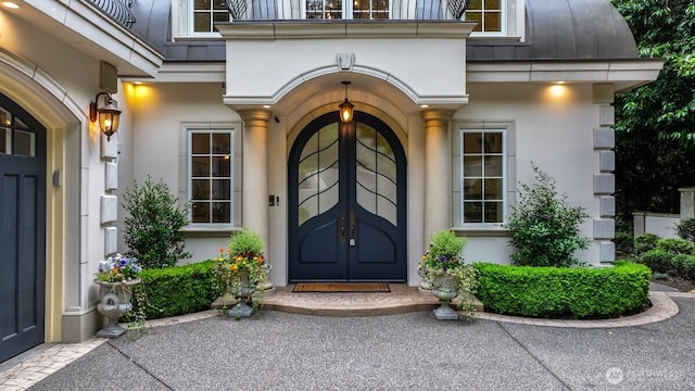 3210 Hunts Point Rd, Hunts Point, WA 98004 - property entrance with stucco siding