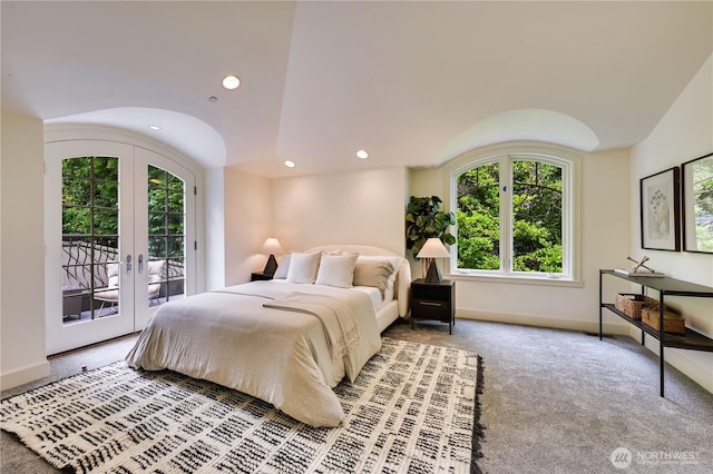 3210 Hunts Point Rd, Hunts Point, WA 98004 - carpeted bedroom with access to exterior, french doors, multiple windows, and recessed lighting