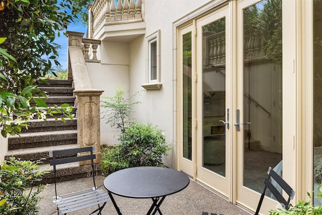 3210 Hunts Point Rd, Hunts Point, WA 98004 - view of patio / terrace featuring french doors