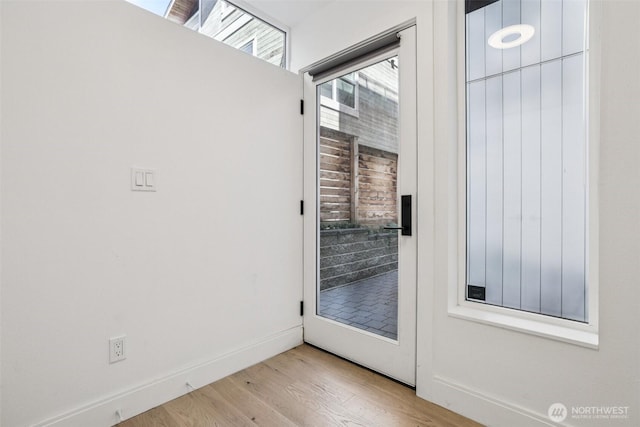 805 Taylor Ave N Unit D, Seattle, WA 98109 - entryway with wood finished floors and baseboards
