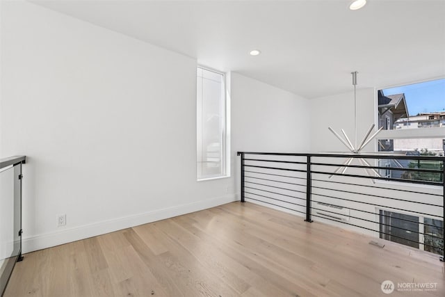 805 Taylor Ave N Unit D, Seattle, WA 98109 - unfurnished room featuring wood finished floors and recessed lighting