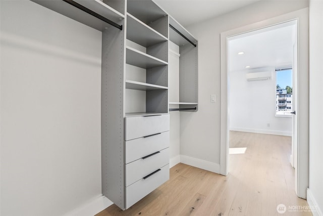 805 Taylor Ave N Unit D, Seattle, WA 98109 - spacious closet with a wall unit AC and light wood-type flooring