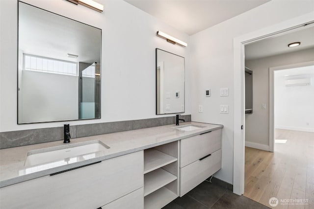 805 Taylor Ave N Unit D, Seattle, WA 98109 - bathroom with double vanity and wood finished floors