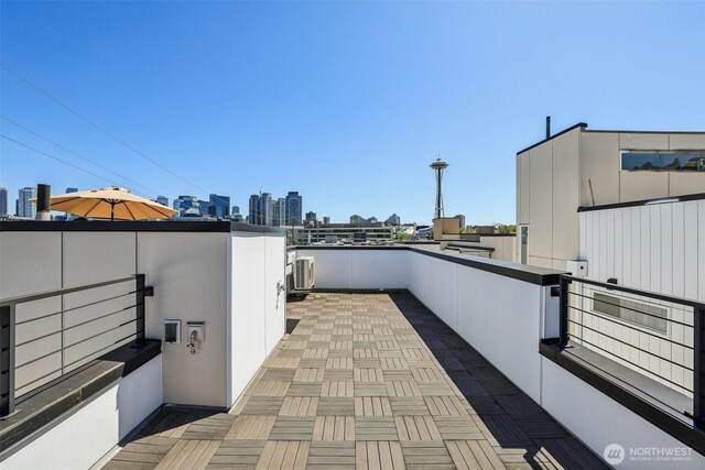 805 Taylor Ave N Unit D, Seattle, WA 98109 - patio / terrace featuring a view of skyline