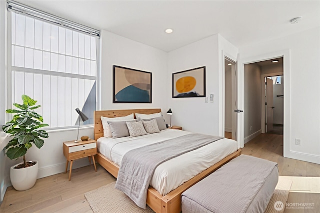 805 Taylor Ave N Unit D, Seattle, WA 98109 - bedroom with light wood-style floors and recessed lighting