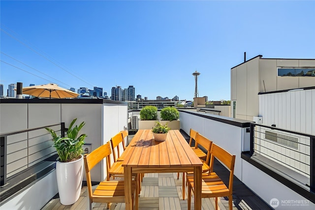 805 Taylor Ave N Unit D, Seattle, WA 98109 - patio / terrace with a skyline view and outdoor dining space