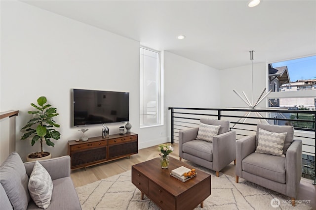 805 Taylor Ave N Unit D, Seattle, WA 98109 - living room with light wood finished floors and recessed lighting