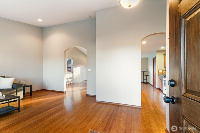 5983 Honeycutt Ct, Ferndale, WA 98248 - foyer entrance featuring arched walkways, light wood finished floors, and recessed lighting