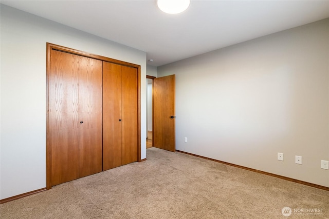 5983 Honeycutt Ct, Ferndale, WA 98248 - unfurnished bedroom featuring light colored carpet and a closet