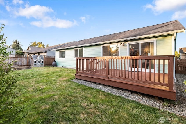 5983 Honeycutt Ct, Ferndale, WA 98248 - rear view of house with a fenced backyard and a wooden deck