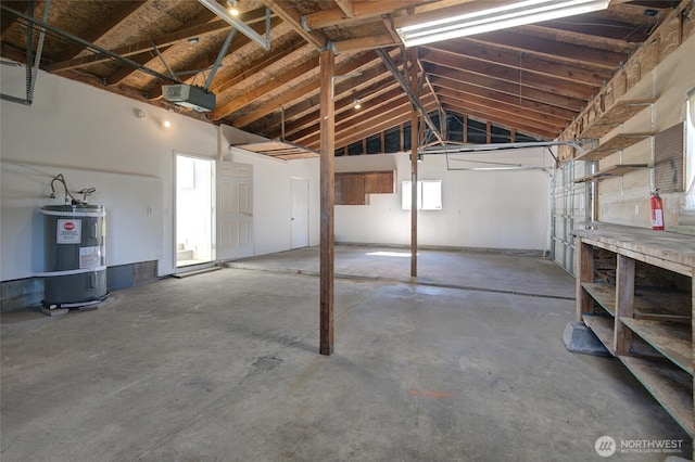 408 N 11th St, Elma, WA 98541 - garage with secured water heater and a garage door opener