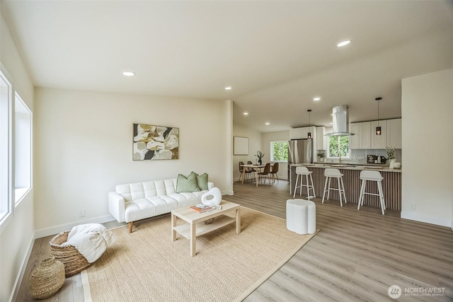 1322 Crescent Ave, Centralia, WA 98531 - living area with light wood-style flooring, vaulted ceiling, and recessed lighting